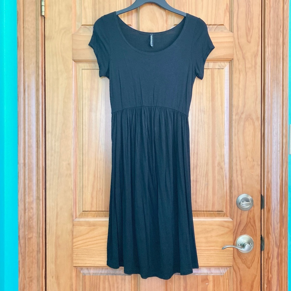 Women’s size small Sage Brush Trading Co. knee length short sleeved black dress